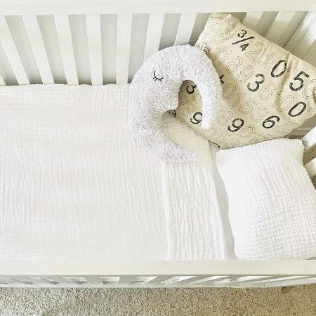 Muslin blanket in on sale crib